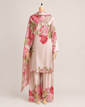 Blush pink floral three-piece Pakistani suit on mannequin
