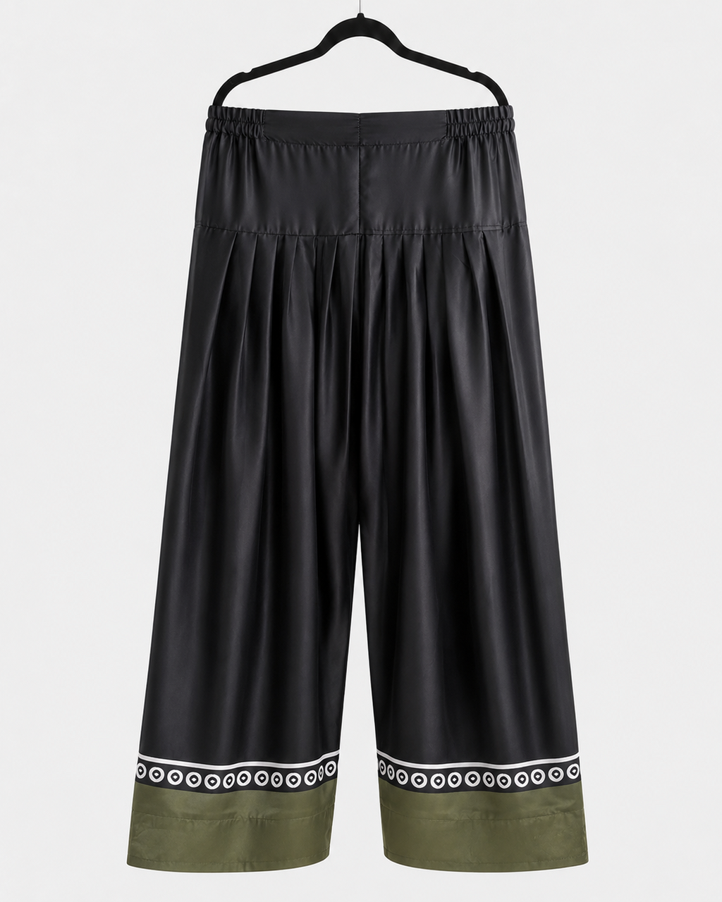 Black wide-leg trousers with olive and monochrome decorative hem from the BACTRA Gulzar Noir suit