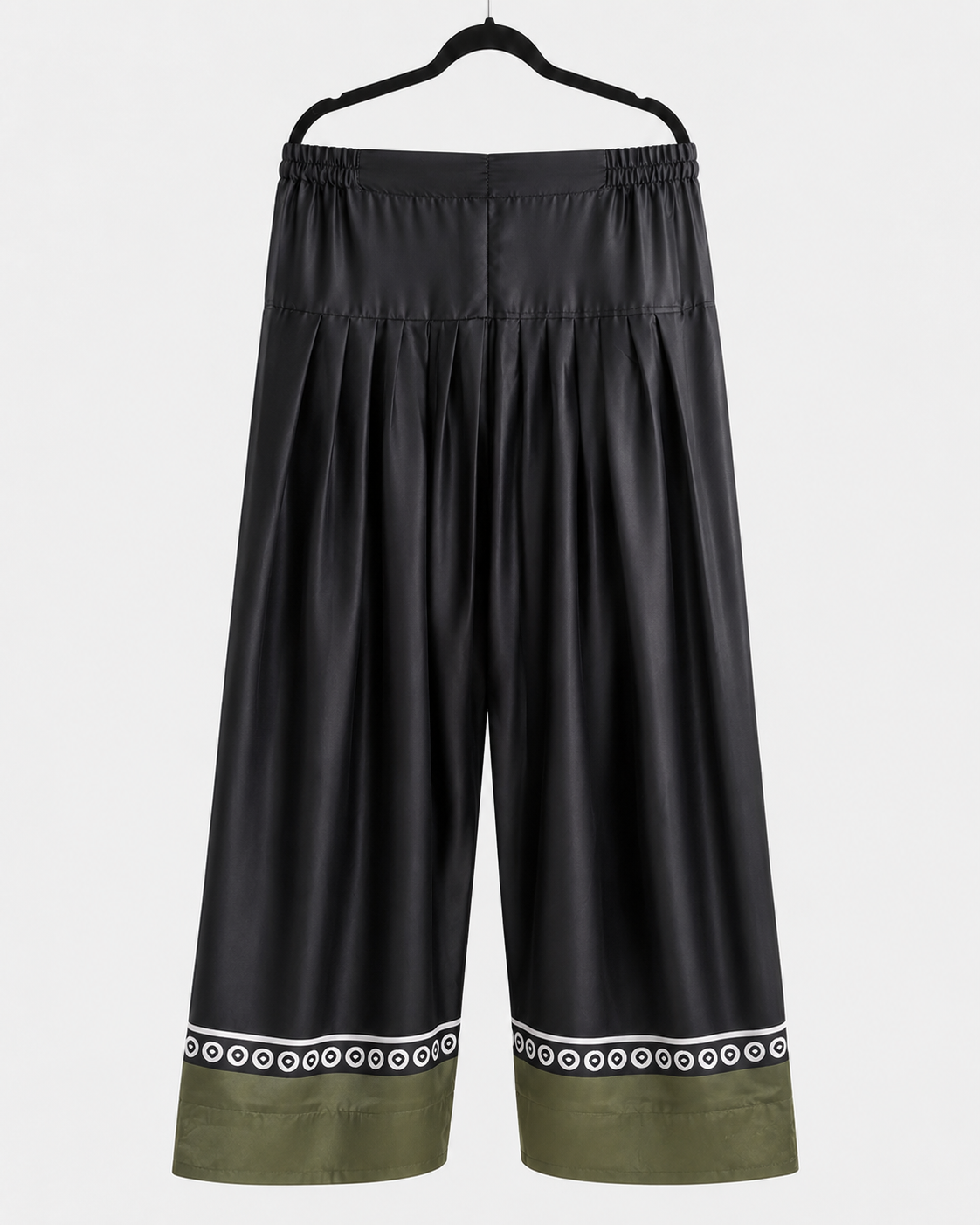 Black wide-leg trousers with olive and monochrome decorative hem from the BACTRA Gulzar Noir suit