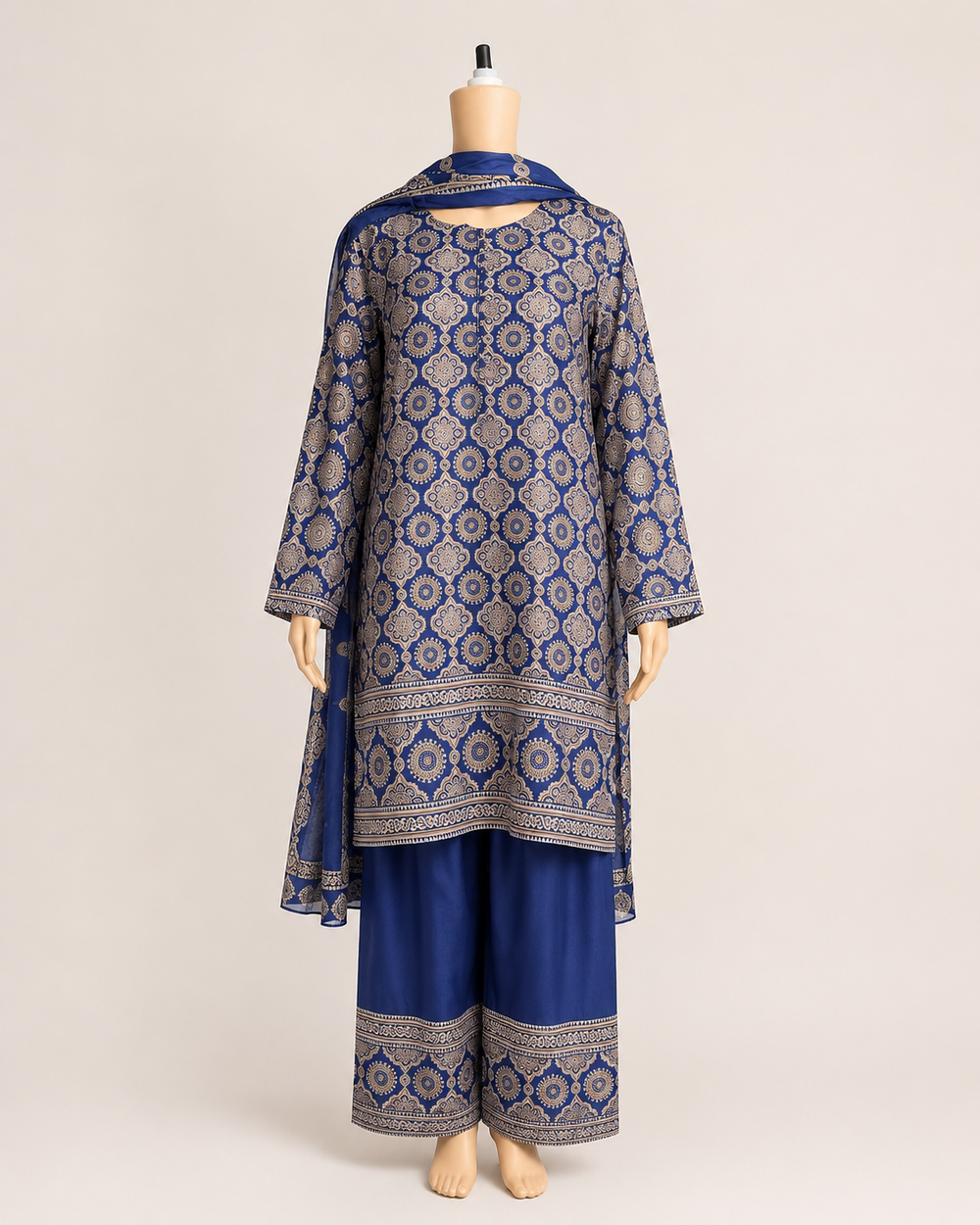Full mannequin view of BACTRA navy and beige medallion three-piece suit