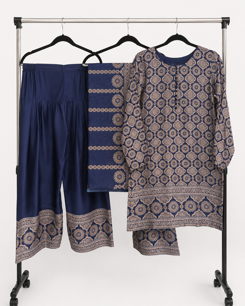 BACTRA navy medallion three-piece suit with kurta trousers and dupatta on rack