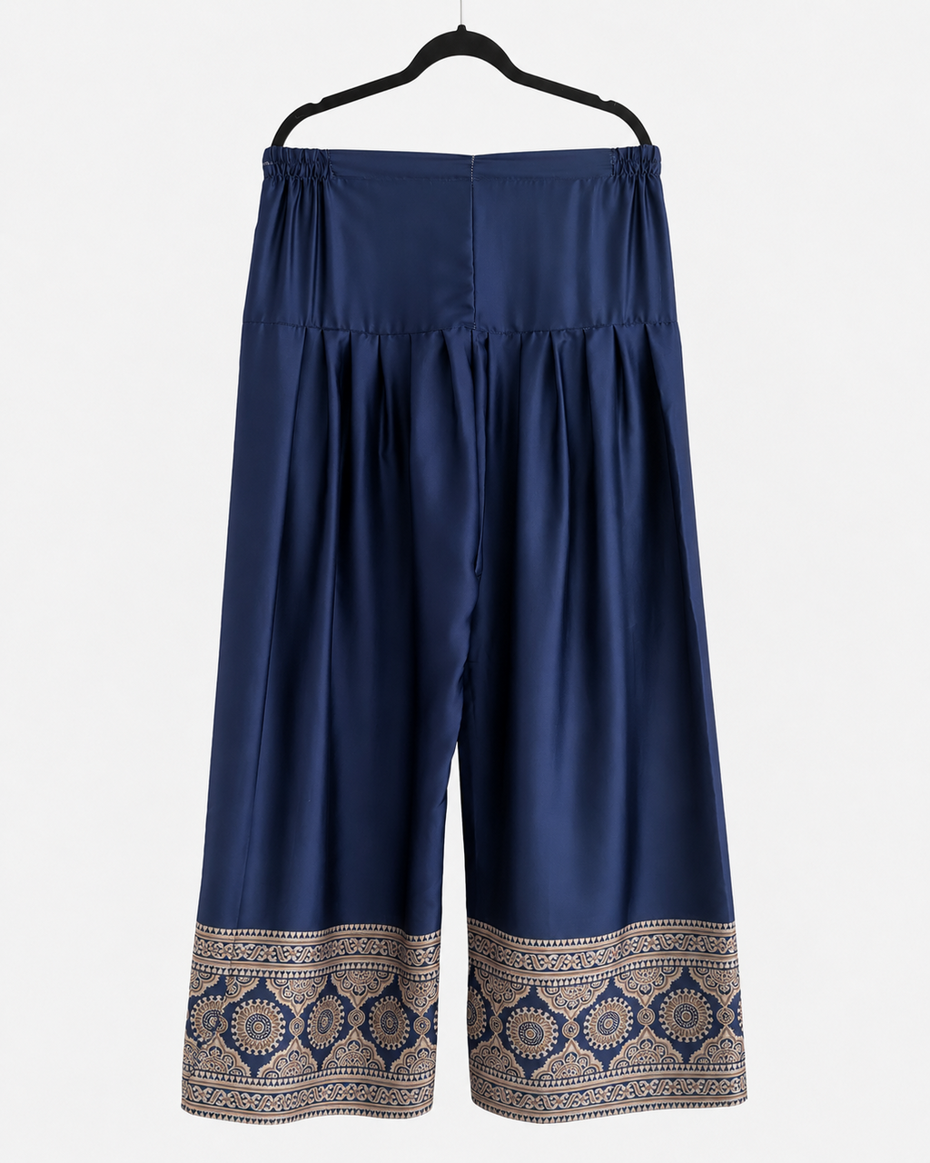 Navy wide-leg trousers with beige medallion border print