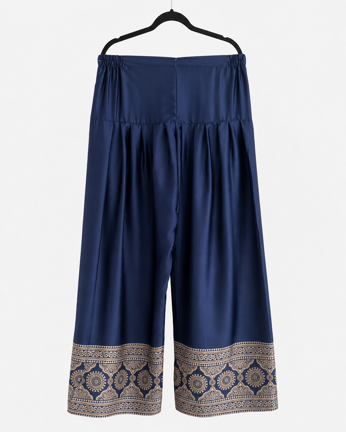 Navy wide-leg trousers with beige medallion border print
