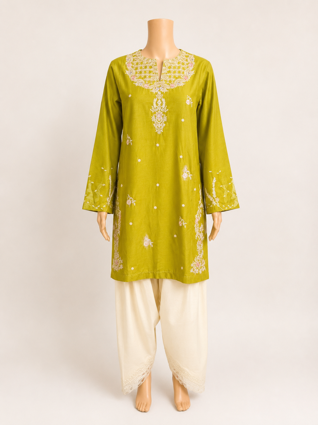 Full mannequin view of BACTRA olive embroidered two-piece suit with ivory trousers