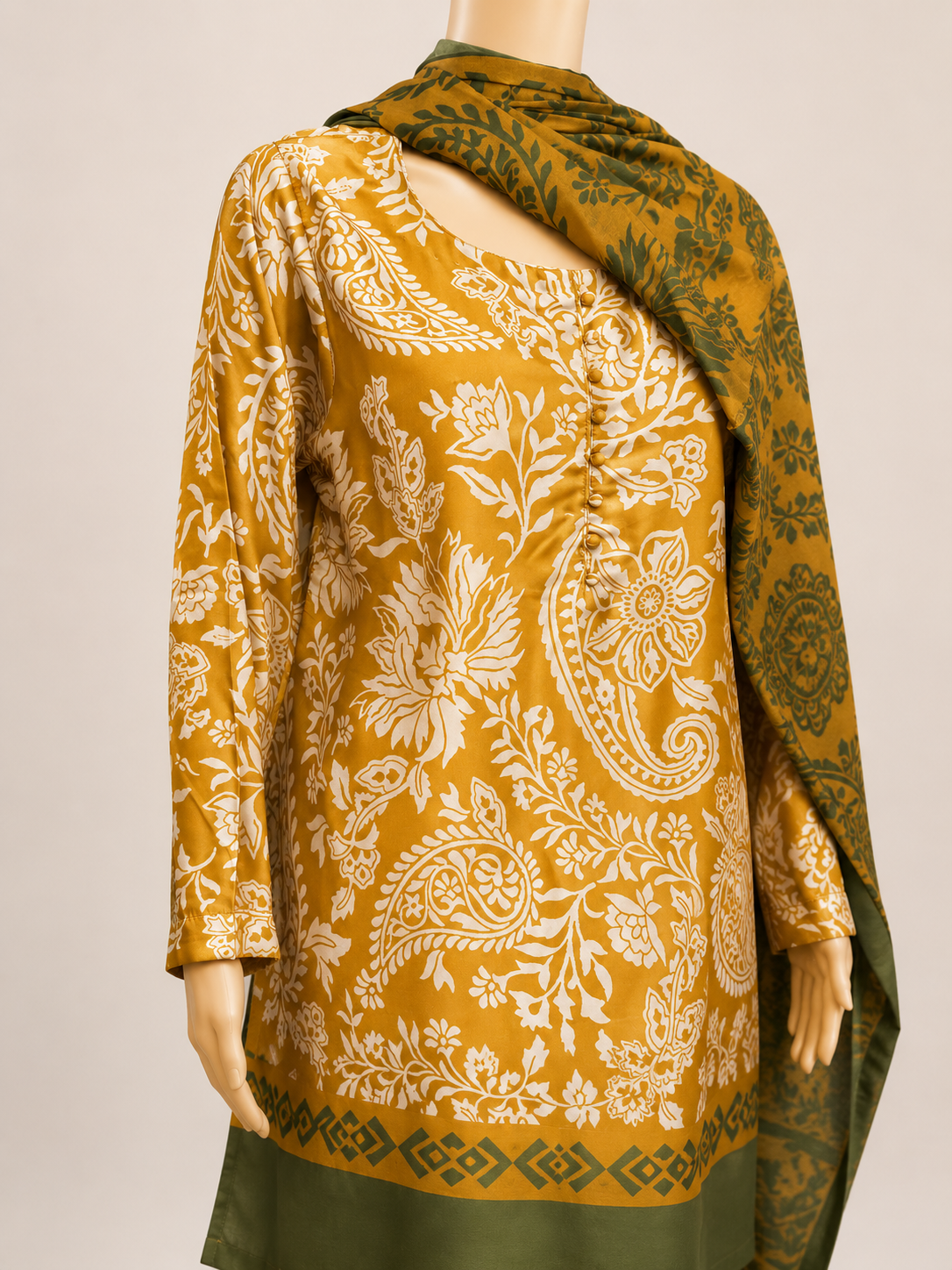 BACTRA mustard printed kurta with olive dupatta on mannequin